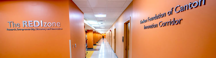 REDI_about-cooridor-750 A hallways in the REDIzone are bright orange.