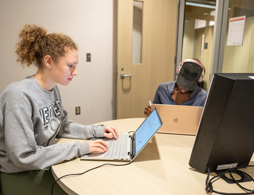 admissions-500 Two students studying in Giant Eagle commons.