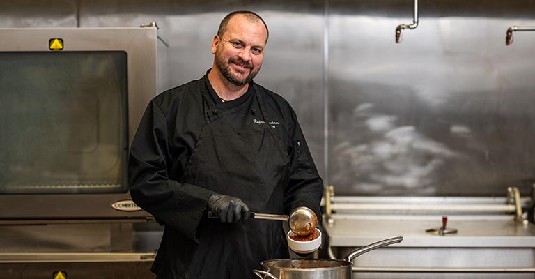 A chef in a kitchen.