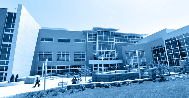 The exterior of NEOMED in Rootstown, Ohio, on a sunny summer day.
